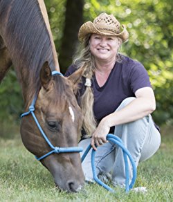 Elena Hartwell author photo with horse