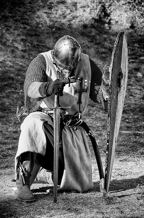 Knight Medieval kneeling image with sword